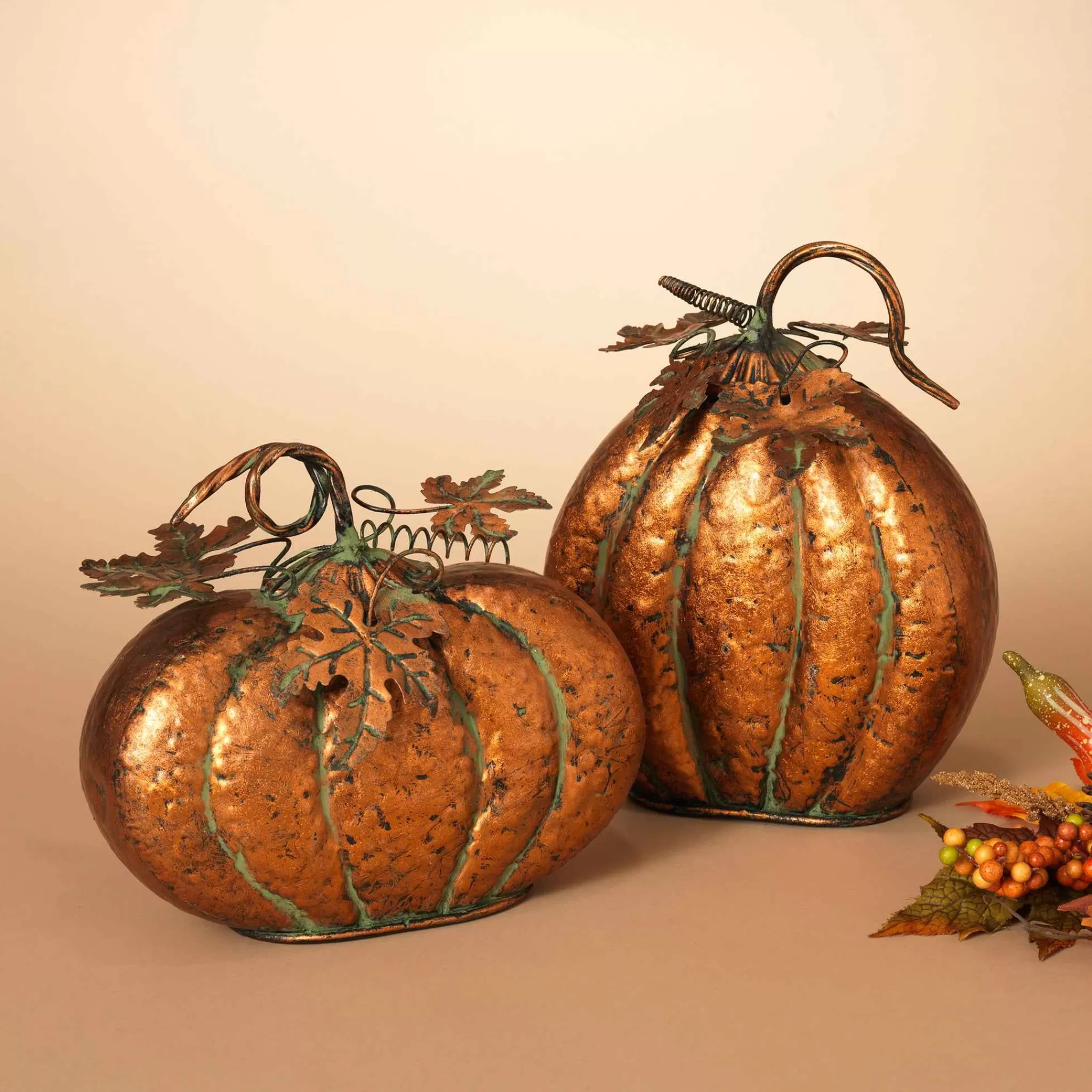 Gerson International Set Of 2 Assorted Metal Harvest Tabletop Pumpkins With Leaf Accents